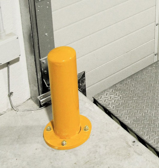 Pivotes de protección para guías de puertas seccionales